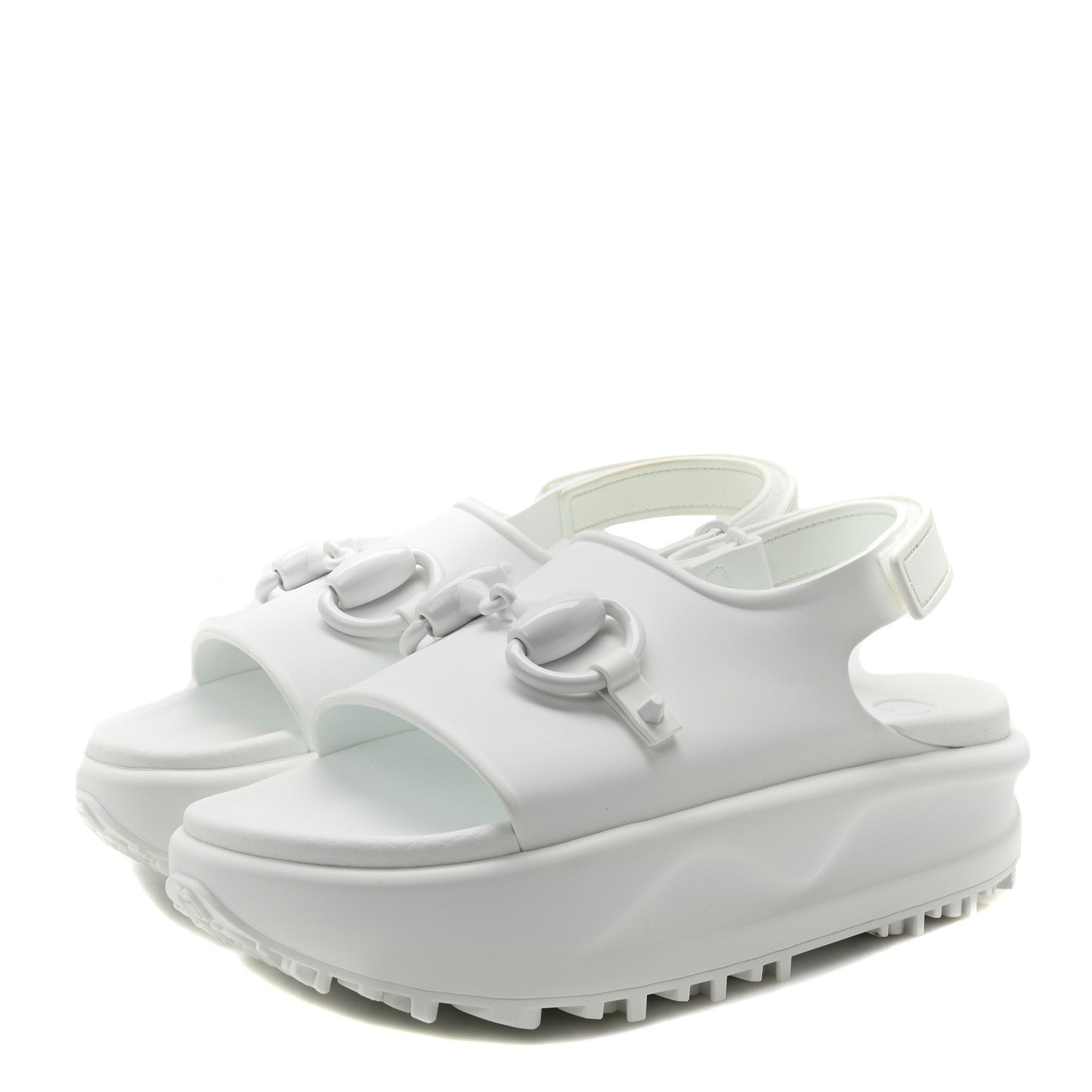 White sandals with a platform sole on a white background